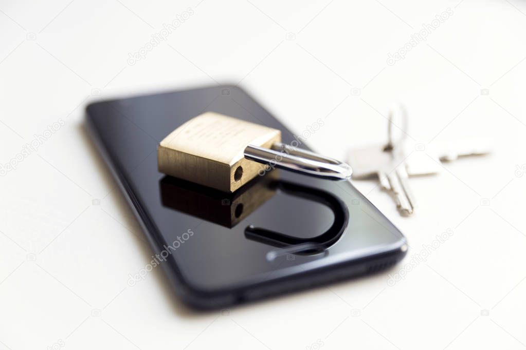 Cellphone data security - lock, keys and phone on white background