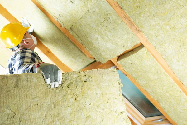 Man Installing Thermal Roof Insulation Layer Using Mineral Wool Panels — Stock Photo, Image