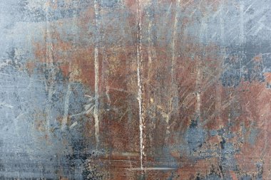 Birden fazla çizik ve kusurları yaşındaki korozyon ile yıpranmış eski paslı doku.