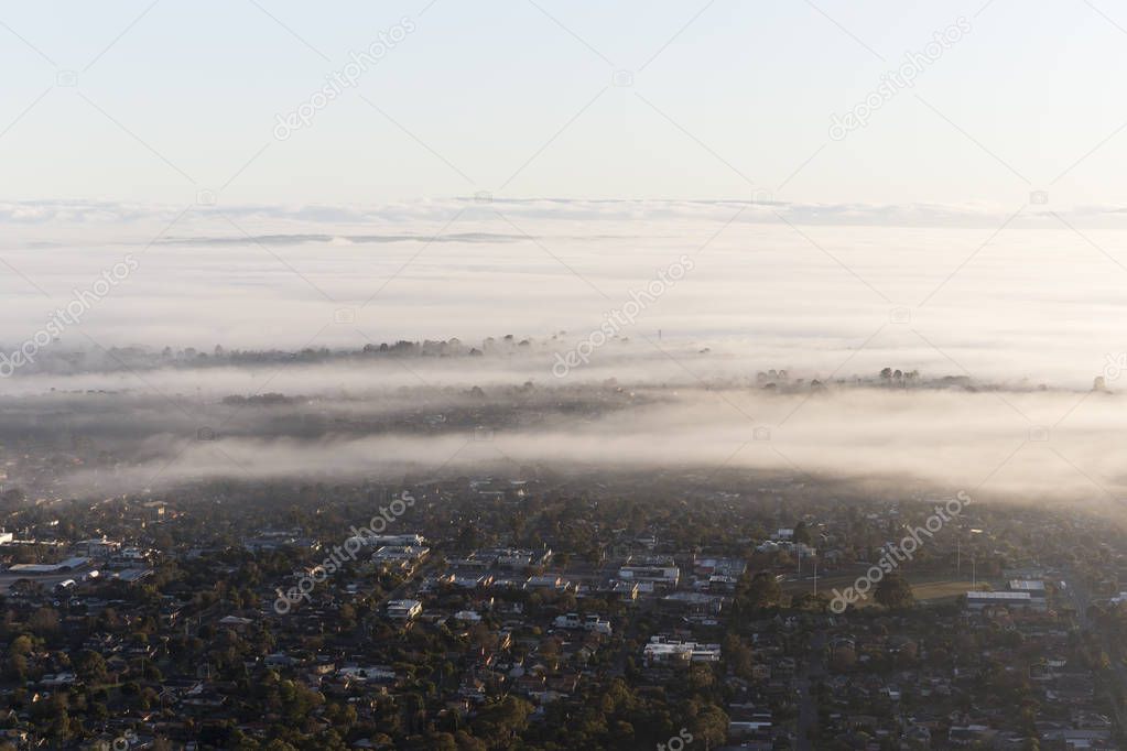 Fogs layers building in an urban sky.