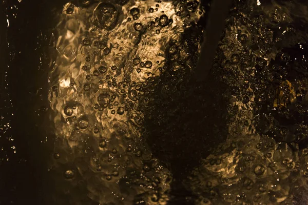 Плескіт води абстрактної золоті — стокове фото