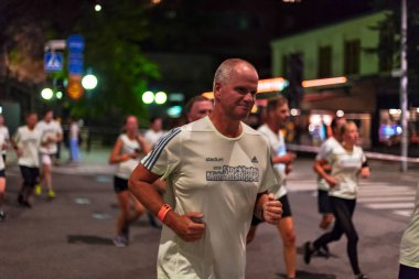 Stokholm, İsveç, 18 Ağustos, 2018: Merkezi Stockholm, Güney bölgelerinde sokaklarında koşmak gece yarısı da Midnattsloppet denir.