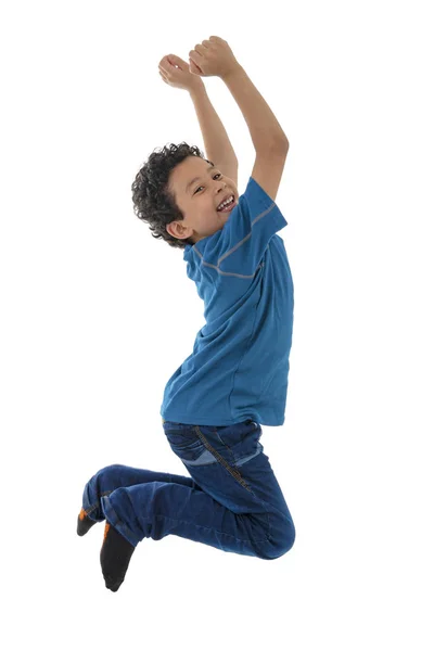 年轻的活跃男孩在白色背景下孤立的空气中跳跃 — 图库照片