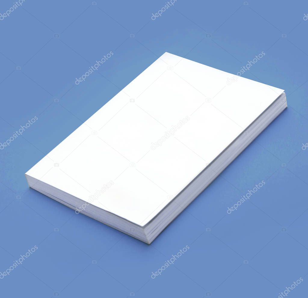 Blank Book WIth White Cover on Blue Background