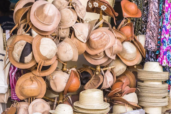 Leather and straw hats in craft store Brazil