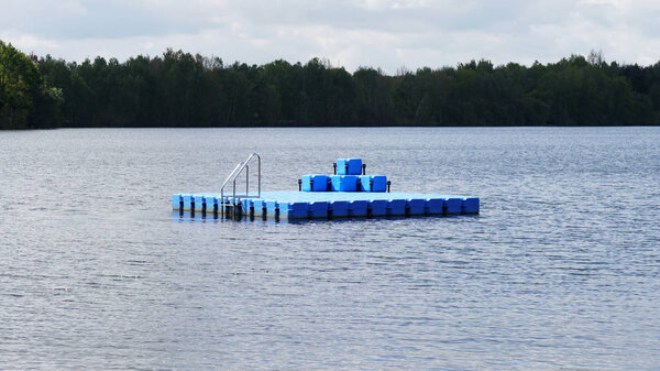 swim or swimming platform on bathing lake