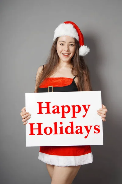 Senhorita santa desejando férias felizes — Fotografia de Stock