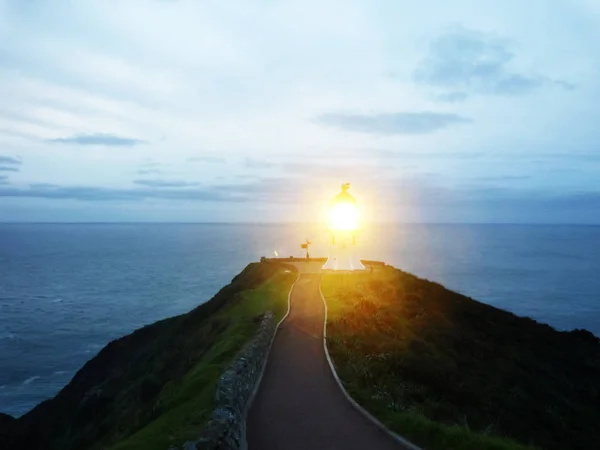 Cape Reinga fenerinde sonra günbatımı, Yeni Zelanda