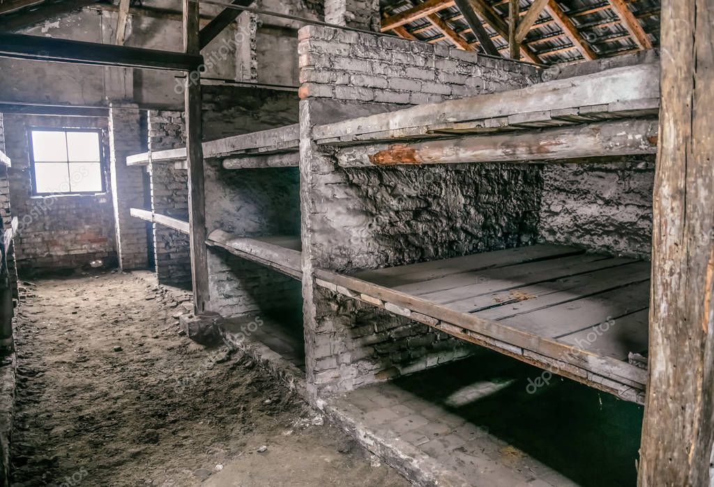 Oswiecim / Poland - 02.15.2018: Prisoner's beds, bunks inside barrack in Auschwitz Birkenau Museum.