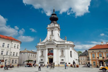 Wadowice / Poland - July 7.2018: Basilica of the Holy Mary in the main square Wadowice, city where pope John Paul II was born.  clipart