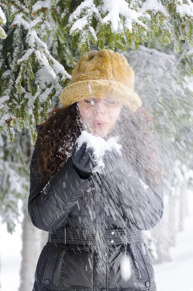 Young Girl Blowing Snow Her Palms Snowy Day Forest Pine — Stock Photo, Image