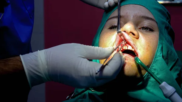 Dental implant surgery, apicectomia gum operation, closeup