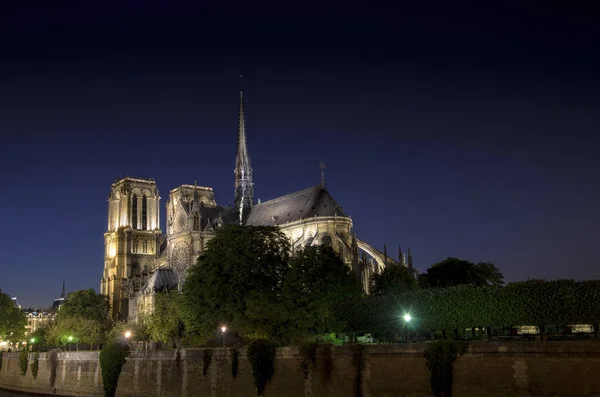 Notre dame de Paris by night and the Seine river France in the city of Paris