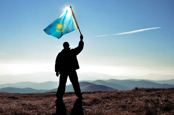 Silhouette Man Holding Waving Kazakhstan Flag Top Mountain Peak — Stock Photo, Image