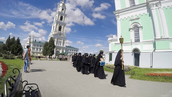 DIVEEVO, RUSSIA - circa AUGUST, 2016: Monks during ceremony at Trinity Cathedral of Holy Trinity-Saint Seraphim-Diveyevo Monastery