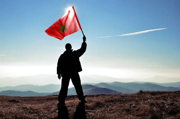 Silhouette Man Holding Waving Morocco Flag Top Mountain Peak — Stock Photo, Image
