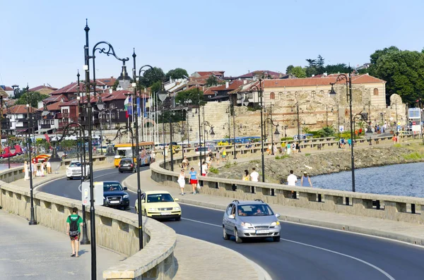 Summer in Nesebar, traffic to and from narrow passage toward old town