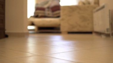 Woman getting undress, panties falling down, underwear panties knickers drop in tile floor, cinematic view