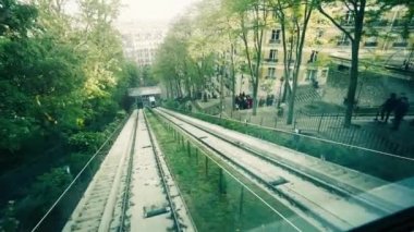 Tourist POV ride on the funicular on a hill Montmartre slope way to Sacre-Coeur Basilica, SLOW MOTION