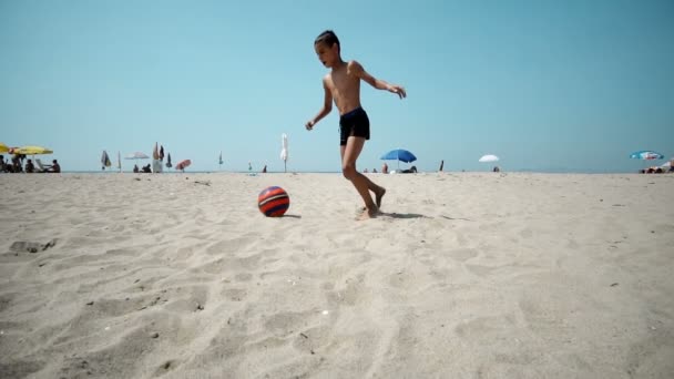 Child Playing Soccer Beach Slow Motion — Stock Video