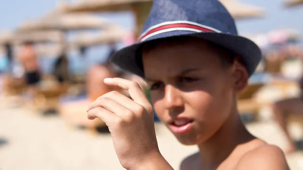 Happy Hispanic Boy Hat Beach Smiling Camera Cinematic Dof — Stock Photo, Image