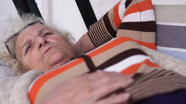 Talking Elder Woman Lying Garden Porch Swing Bed Closeup — Stock Photo, Image