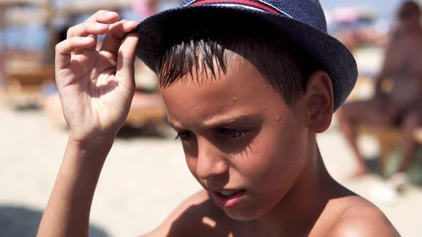 Young Boy Dazzled Summer Sun Beach Put Protection Hat Smile — Stock Photo, Image