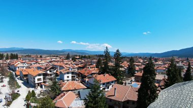 Panoramic aerial view of Bansko town, Bulgaria a famous ski centar and world ski cup winter resort clipart