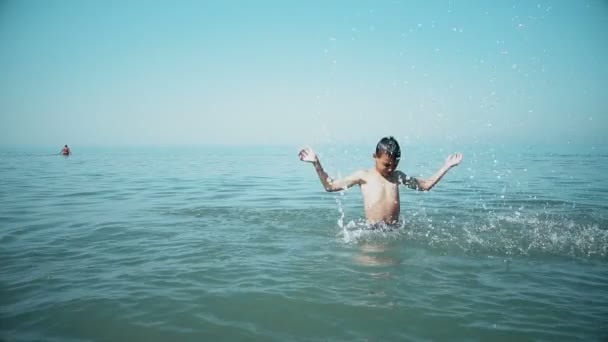 Happy Boy Splashing Turquoise Water Sea Tropical Resort Beach Slow — Stock Video