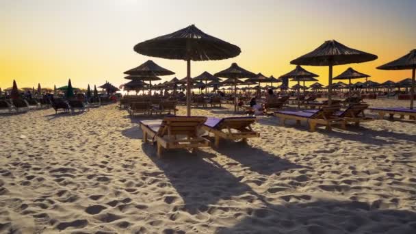 Luxury Summer Beach Resort Straw Umbrellas Sunset Cinematic Steadicam Shot — Stock Video