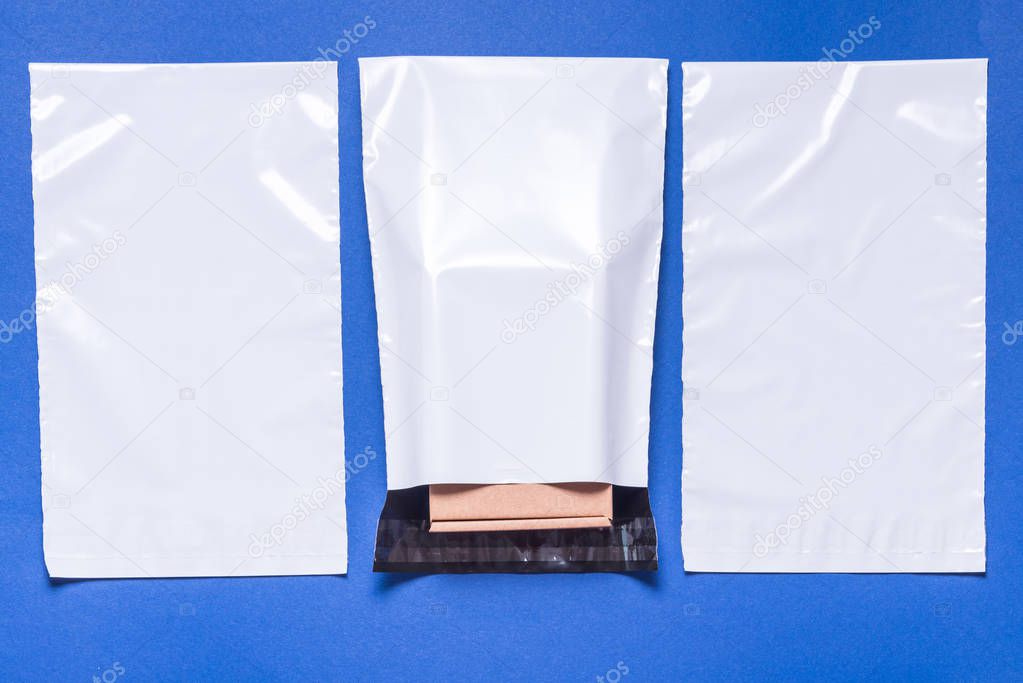 Set of polythene envelopes on blue background