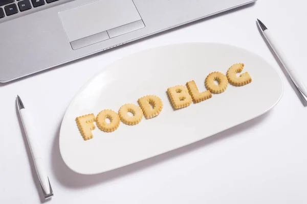 Biscuit letters food blog, office desk top