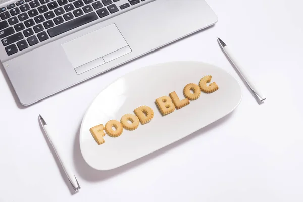 Biscuit letters food blog, office desk top