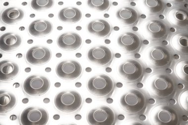 Delikli delikli metal dokulu arka plan