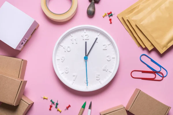 Large clock on logistic company desk, 24 hours delivery