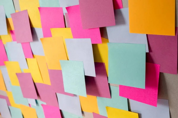 Many color blank sticky note wall background