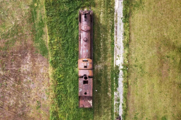 Old train cemetery. Aerial view of an old abandoned rusty steam train.