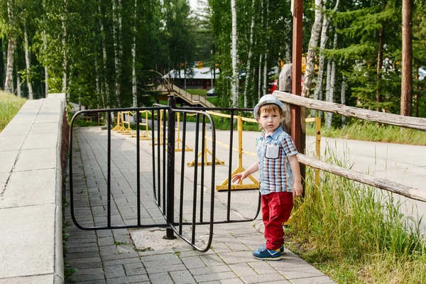 Little Boy Shirt Jeans Hat Stands Turnstile Summer — Stock Photo, Image