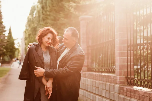 Happy Middle Age Couple Hugging Outdoors Sunset Backlight Summer — Stock Photo, Image