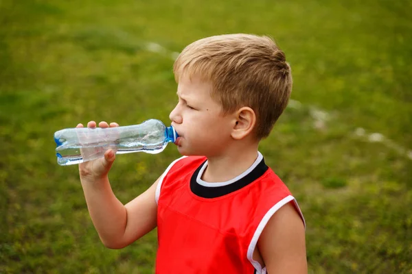 Child Drinking Water Bottle Outdoors — Stock Photo, Image