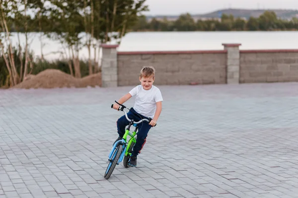 Seven Year Old Boy White Shirt Rides Bicycle Paving Slabs — Stock Photo, Image