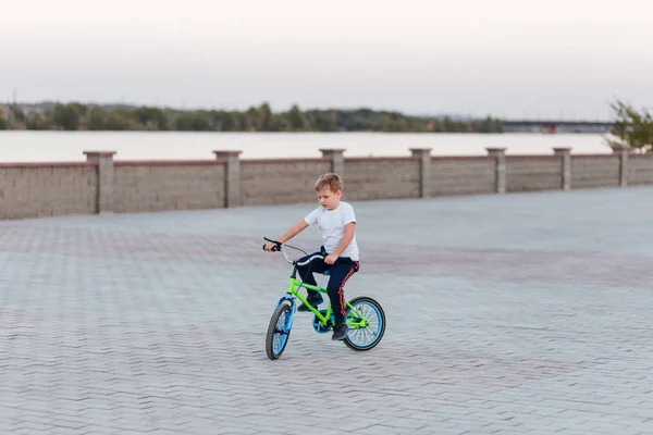 Seven Year Old Boy White Shirt Rides Children Green Bike — Stock Photo, Image