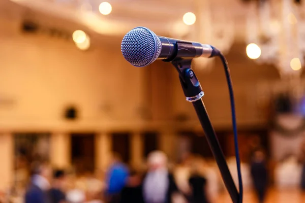 microphone on a stand in the restaurant, blurred background