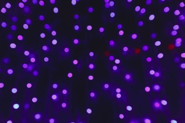 Mor ışıklı bulanık arka plan
