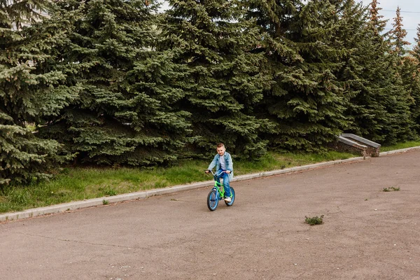 Boy Rides Bike Park Summer Jeanswear — Stock Photo, Image