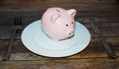 Kumbara bir plaka üzerinde