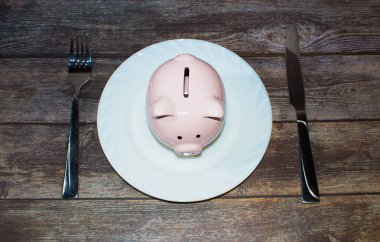 Kumbara bir plaka üzerinde