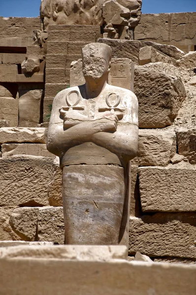 Ancient statue of the egyptian pharaoh in the temple of Karnak in Egypt, Africa