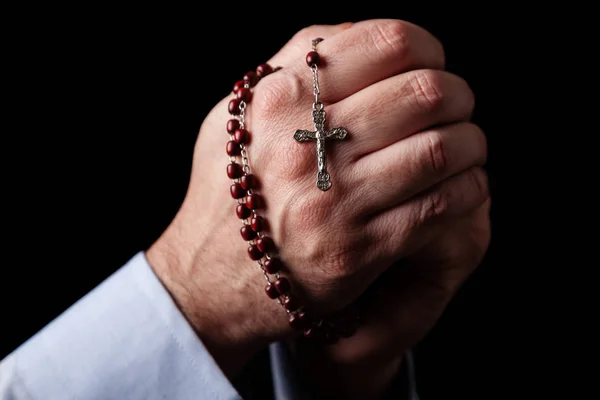 Male Hands Praying Holding Rosary Jesus Christ Cross Crucifix Black — Stock Photo, Image