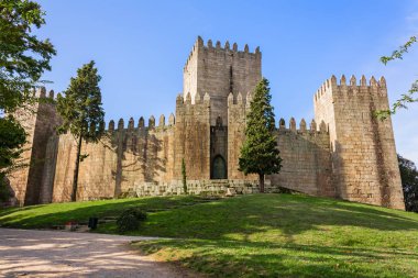 Castelo de Guimaraes Castle. Most famous castle in Portugal. Birth place of the first Portuguese King and the Portuguese nation. Guimaraes, Portugal. clipart